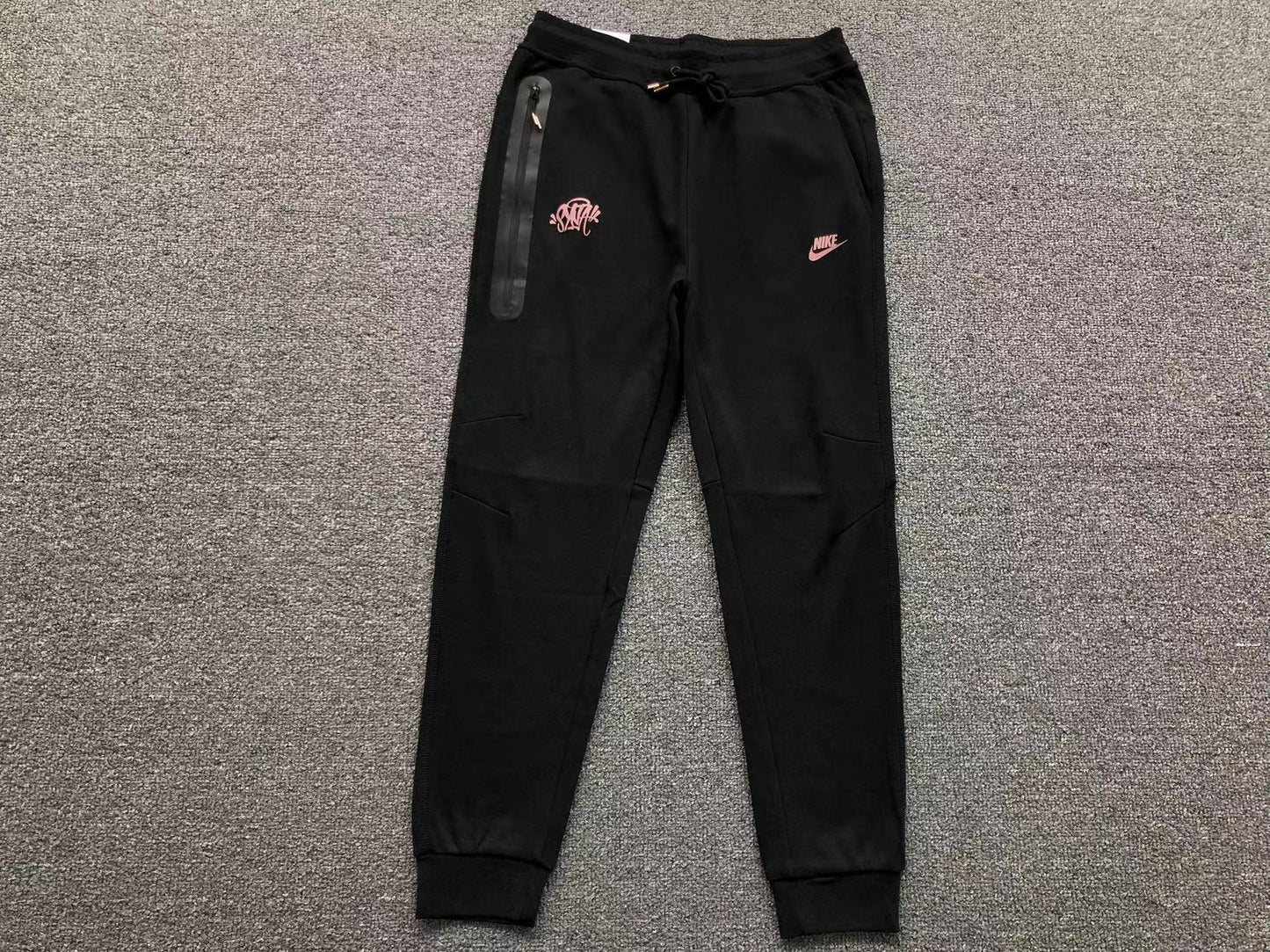 Calça Tech Fleece Nike x Syna