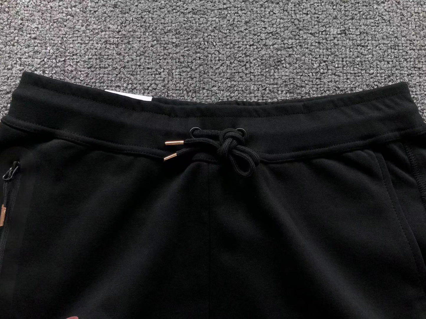 Calça Tech Fleece Nike x Syna